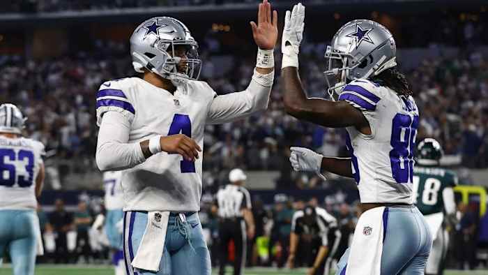 Dallas Cowboys QB Dak Prescott (4) and WR CeeDee Lamb (88)